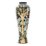 A large Moorcroft Pottery vase of tapering form decorated in the Tree Bark Thief pattern (from the