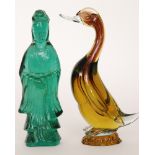 A 20th Century Italian Murano glass figure of a stylised duck in graduated amber atop a textured