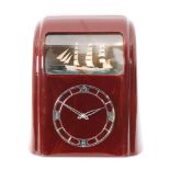 A 1940s Art Deco Vitascope Industries Ltd dark red Bakelite clock,