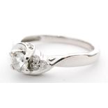 A contemporary 18ct white gold diamond solitaire ring,