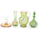 A group of late 19th Century Bohemian green glassware to include a water jug with enamelled insects,