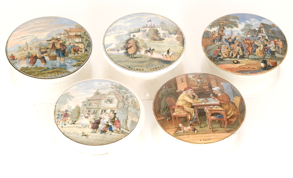 Five assorted late 19th to early 20th Century Staffordshire Prattware pot lids and bases comprising