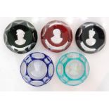 A group of five 20th Century Cristal d'Albret glass paperweights each with a central sulphide