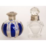 A late 19th Century Bohemian glass scent bottle of faceted globe form cased in blue over clear and