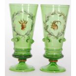 A late 19th Century Bohemian glass vase of footed flared form decorated with applied green glass