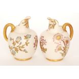 Two late 19th Century Royal Worcester blush ivory shape 1094 flatback jugs each decorated with