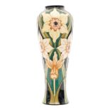 A large Moorcroft Pottery vase of tapering form decorated in the Daffodil pattern designed by