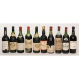 A bottle of 1937 Grand Cru Chateau La Lagone, a 1952 bottle of Nuits-St-Georges,