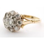 An 18ct diamond daisy cluster ring,