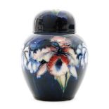 A 1930s Moorcroft vase and cover (modelled on a Temple jar and cover) decorated in the Frilled