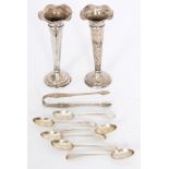 A pair of hallmarked silver trumpet vases of plain form, heights 17cm,
