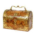 A 19th Century burr walnut domed top stationery box detailed with a monogram above the lock with