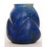 A Ruskin Pottery crystalline glaze vase of swollen form with a moulded wavy line to the centre,