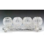 A late 19th Century Stevens & Williams clear crystal glass posy vase with four small spherical