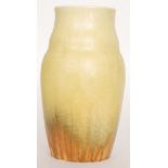 A large Ruskin Pottery crystalline glaze vase decorated in a pale yellow with green dribbling