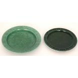 Two Ruskin Pottery dishes, the first decorated in a mottled and tonal green,