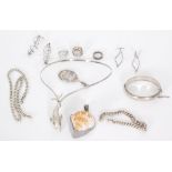 A small parcel lot of assorted silver and white metal jewellery to include earrings, rings,