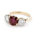 A 1970s 18ct ruby and diamond three stone ring,