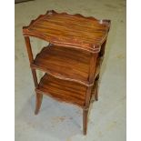 A small mahogany three tier etagere with raised gallery border on splayed legs,