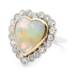 An 18ct white gold opal and diamond heart shaped ring, central heart shaped opal,