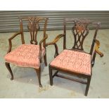 A 19th Century Chippendale style mahogany elbow chair with pierced vase splat and slip in seat on