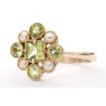 A 9ct hallmarked Edwardian style peridot and seed pearl cluster ring central square cut peridot
