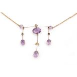 An early 20th Century amethyst and seed pearl fringe necklet,