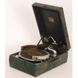 An HMV model 102 portable gramophone in black leather case and an Indian portable walnut cased