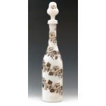 A large 19th Century George Bacchus & Sons opal glass decanter of slender bottle form rising to a