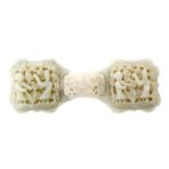 A Chinese celadon jade three part belt buckle,