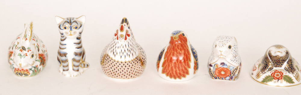 Six assorted Royal Crown Derby paperweights comprising a chicken, robin,
