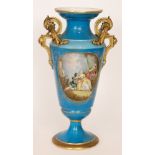 A large late 19th Century pedestal vase decorated with a central Watteauesque scene of three