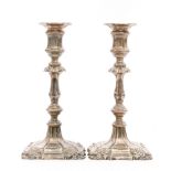 A pair of hallmarked silver candlesticks,