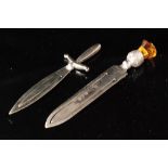 A hallmarked silver bookmark modelled as a dagger, length 7cm,