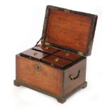 A 19th Century mahogany crossbanded tea caddy with twin brass drop handles above bracket feet,