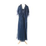A 1970s John Bates for Jean Varon lady's vintage dress with a blue polyester shift dress under a