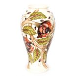 A Moorcroft Pottery vase decorated in the Pirouette Breeze pattern, designed by Emma Bossons,