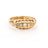 An early 20th Century 18ct hallmarked five stone diamond boat shaped ring,