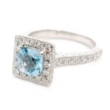 An Art Deco style platinum diamond and aquamarine ring,