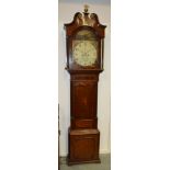 A 19th Century oak and mahogany longcase clock by Richard Clinton Eccleshall with painted arch dial
