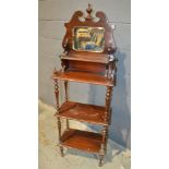 A Victorian beech three-tier what-not,