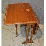 An Edwardian satinwood crossbanded mahogany Sutherland table,