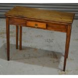 A 19th Century mahogany rectangular fold over tea table fitted with a small frieze drawer on