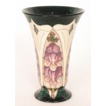 A boxed Moorcroft Pottery trumpet vase decorated in the Foxglove pattern designed by Rachel Bishop,
