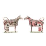 A mirrored pair of early 19th Century creamware cow creamers and covers each with milkmaids,