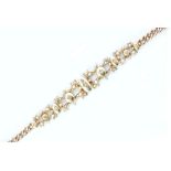 An early 15ct and 9ct diamond and seed pearl set bracelet,