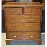 A reproduction mahogany chest of two short over three long drawers in the Georgian style,