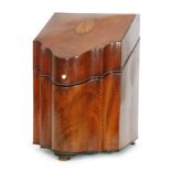 A 19th Century mahogany serpentine knife box with inlaid detail,