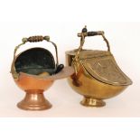 An Edwardian brass fan shaped coal scuttle and shovel and a similar copper helmet shaped coal