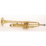 A 20th Century brass trumpet by Lamy, London, length 56cm.